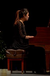 Programs: High-school student performs at a recital